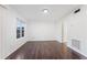 Spacious living room with hardwood floors and a bright window view at 3775 Reston Ln, Decatur, GA 30034