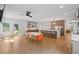 Open concept kitchen with a large island, stainless steel appliances, and hardwood floors at 9950 Farmbrook Ln, Johns Creek, GA 30022