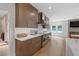 Gourmet kitchen with stainless steel appliances and custom cabinetry at 9950 Farmbrook Ln, Johns Creek, GA 30022