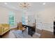 Well-appointed office with natural light, modern fixtures, and a versatile layout ideal for remote work at 9950 Farmbrook Ln, Johns Creek, GA 30022