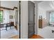Open hallway connecting the office and bedroom, showcasing the home's seamless layout at 11660 Crabapple Rd, Roswell, GA 30075