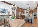 Charming kitchen with wood cabinets, stainless steel appliances, and a central island with bar seating at 11660 Crabapple Rd, Roswell, GA 30075