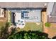 Aerial view of the deck, patio and backyard featuring an outdoor firepit and seating at 155 Marlow Dr, Woodstock, GA 30188