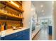 Butler's Pantry with cabinetry and hardwood floors at 155 Marlow Dr, Woodstock, GA 30188