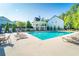 Inviting community pool with a pavilion, ample seating, and well-maintained landscaping at 155 Marlow Dr, Woodstock, GA 30188