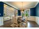 Dining room featuring a large window and hardwood floors at 155 Marlow Dr, Woodstock, GA 30188