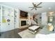 Living room features built-in bookshelves, fireplace, and hardwood floors at 155 Marlow Dr, Woodstock, GA 30188