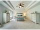 Bright and airy main bedroom with tray ceiling and neutral colored walls at 155 Marlow Dr, Woodstock, GA 30188
