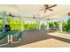 Spacious community pavilion with ceiling fans, picnic tables, and outdoor grilling area at 155 Marlow Dr, Woodstock, GA 30188