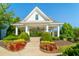 Community pavilion with lush landscaping including colorful flower beds at 155 Marlow Dr, Woodstock, GA 30188