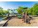 Community playground featuring a fun play structure, slides, and benches, perfect for outdoor activities at 155 Marlow Dr, Woodstock, GA 30188