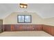Spacious basement with wood paneling and a window that lets in plenty of light at 1559 Norwood Dr, Lilburn, GA 30047