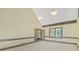 Bedroom with high ceilings, decorative trim, natural light, and access to a closet or bathroom at 1559 Norwood Dr, Lilburn, GA 30047