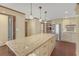 Bright kitchen with stainless steel appliances, granite countertops, and custom cabinetry at 1559 Norwood Dr, Lilburn, GA 30047