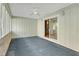 A bright, airy sun room with multiple windows and an entrance with sliding glass doors at 1559 Norwood Dr, Lilburn, GA 30047