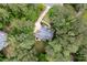 Bird's-eye view of a home with beautiful landscaping and a private, wooded setting at 529 Wintergreen Way, Canton, GA 30115