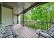 Spacious front porch with comfortable seating, providing a serene outdoor area at 529 Wintergreen Way, Canton, GA 30115