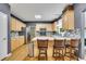 Bright kitchen featuring stainless steel appliances, granite countertops, and a stylish backsplash at 529 Wintergreen Way, Canton, GA 30115