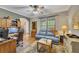 Cozy sitting room with comfortable seating and a bright window at 529 Wintergreen Way, Canton, GA 30115