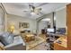 Comfortable office and sitting room with neutral paint, ceiling fan, and natural light at 529 Wintergreen Way, Canton, GA 30115