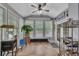 Inviting sunroom filled with natural light, perfect for relaxation and enjoying the outdoors at 529 Wintergreen Way, Canton, GA 30115