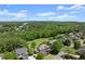 Panoramic aerial view of the property showcasing mature trees and neighborhood amenities at 146 Cedar Woods Trl, Canton, GA 30114