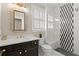 Modern bathroom features a patterned glass shower, and updated vanity with stylish fixtures at 146 Cedar Woods Trl, Canton, GA 30114