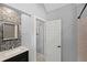 Clean bathroom with tiled shower, mosaic wall, and modern fixtures at 146 Cedar Woods Trl, Canton, GA 30114
