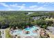 Aerial view of the community pool, complete with a lazy river and water slide at 146 Cedar Woods Trl, Canton, GA 30114
