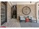 Charming covered patio with comfortable seating and tasteful decor at 146 Cedar Woods Trl, Canton, GA 30114