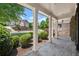 Charming front porch view with manicured lawn and landscaping at 146 Cedar Woods Trl, Canton, GA 30114