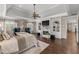 Spacious main bedroom boasts hardwood floors, tray ceilings, fireplace and large windows with natural light at 146 Cedar Woods Trl, Canton, GA 30114