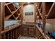 Wine cellar with custom wood racking, storage, and perfect temperature control for wine enthusiasts at 146 Cedar Woods Trl, Canton, GA 30114