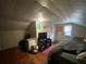 Bedroom featuring hardwood floors, a bed and a TV at 212 South Se Ave, Marietta, GA 30060