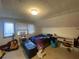 Bedroom featuring natural light, guitar, closet and carpet flooring at 212 South Se Ave, Marietta, GA 30060