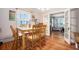 Dining room with hardwood floors, natural light, and access to the living room at 212 South Se Ave, Marietta, GA 30060