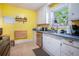 Bright kitchen featuring stainless steel appliances and a large window at 212 South Se Ave, Marietta, GA 30060