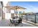 Balcony featuring seating area with umbrella and views of the city skyline at 1280 W Peachtree Nw St # 810, Atlanta, GA 30309
