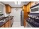 Functional kitchen featuring stainless steel appliances, granite countertops, and ample cabinetry at 1280 W Peachtree Nw St # 810, Atlanta, GA 30309