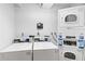 Functional laundry room equipped with multiple washing machines and dryers for residents' convenience at 1280 W Peachtree Nw St # 810, Atlanta, GA 30309