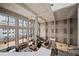 Elegant lobby showcasing high ceilings, comfortable seating, marble floors, and abundant natural light at 1280 W Peachtree Nw St # 810, Atlanta, GA 30309