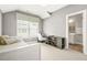 Cozy bedroom area with a built-in desk, a single bed, and an ensuite bathroom at 1436 Belmont Ave, Smyrna, GA 30080