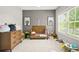 Cozy bedroom with decor, ample natural light, and plush carpeting at 1436 Belmont Ave, Smyrna, GA 30080