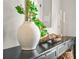 Console table in the hallway with decorative items adding character and style at 1436 Belmont Ave, Smyrna, GA 30080