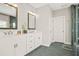 Elegant main bathroom with dual sinks, quartz countertops, and walk-in shower at 1436 Belmont Ave, Smyrna, GA 30080