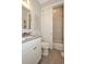 This stylish bathroom features a sliding shower door and modern fixtures at 200 Dawson Dr, Woodstock, GA 30188