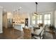 Open kitchen featuring stainless steel appliances, an island, and a dining area at 200 Dawson Dr, Woodstock, GA 30188