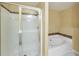 Bright bathroom with a glass-enclosed shower and a separate jetted tub for relaxation at 3094 Lauren Parc Rd, Decatur, GA 30032