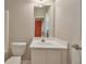 Bathroom features a white vanity, toilet, and neutral wall color at 3094 Lauren Parc Rd, Decatur, GA 30032