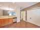 Bright kitchen with stainless steel dishwasher and wood cabinets overlooking the dining area at 3094 Lauren Parc Rd, Decatur, GA 30032